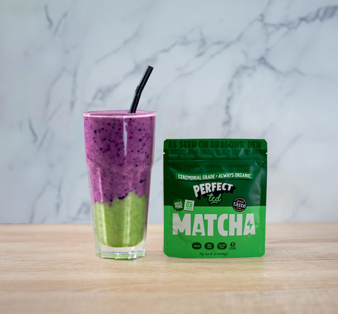 Glass of matcha protein smoothie on a table