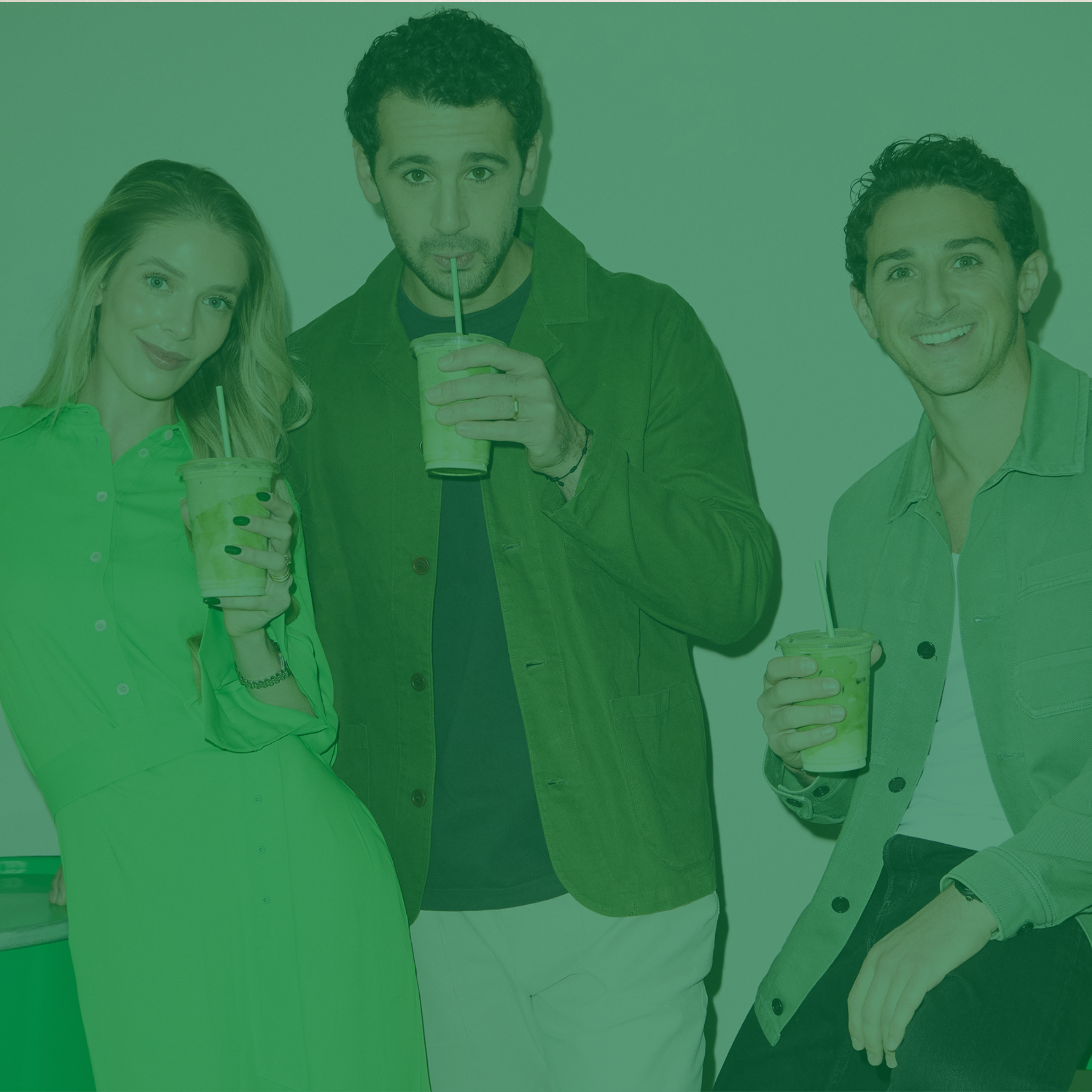 a group of people holding drinks