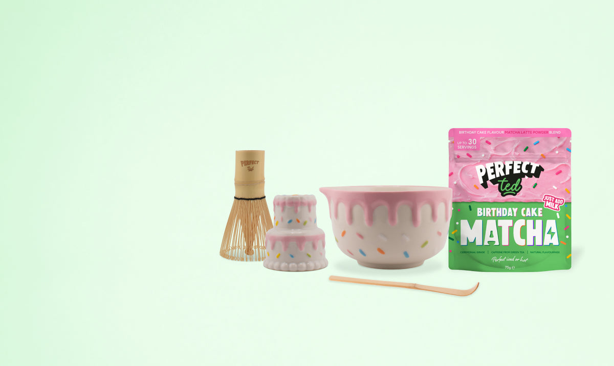 a bowl and whisk and a bag of tea